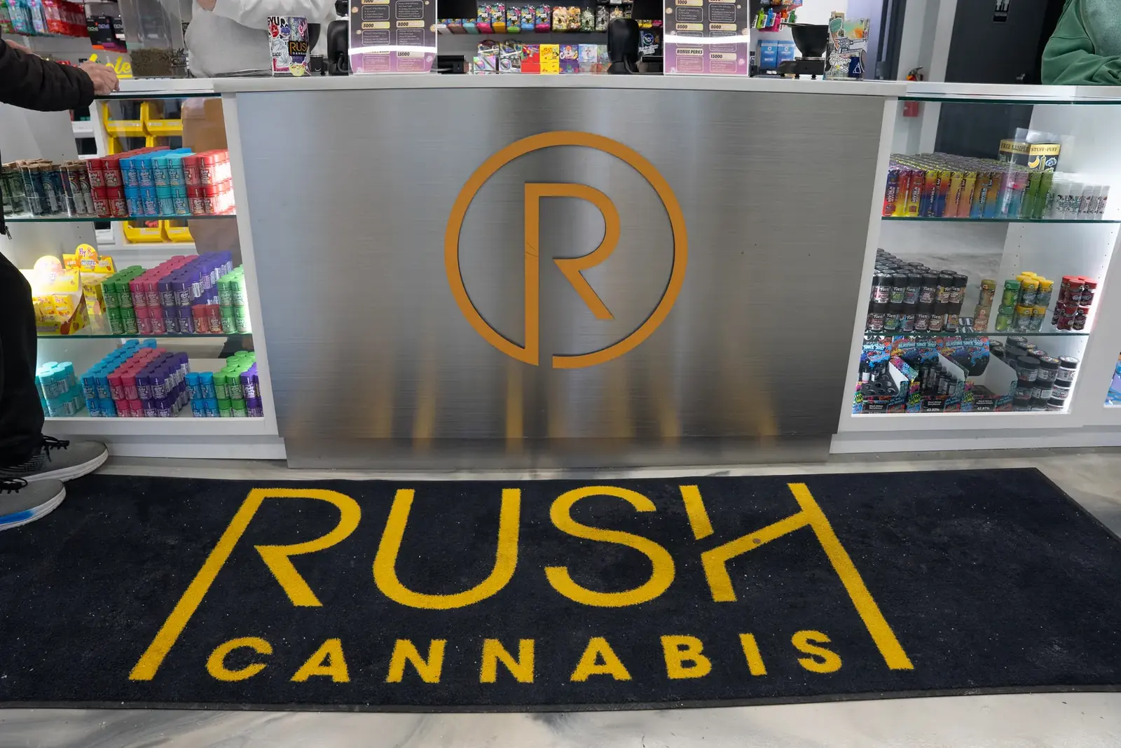 The RUSH Cannabis floor mat with the circle-R brand mark, Hazel Park